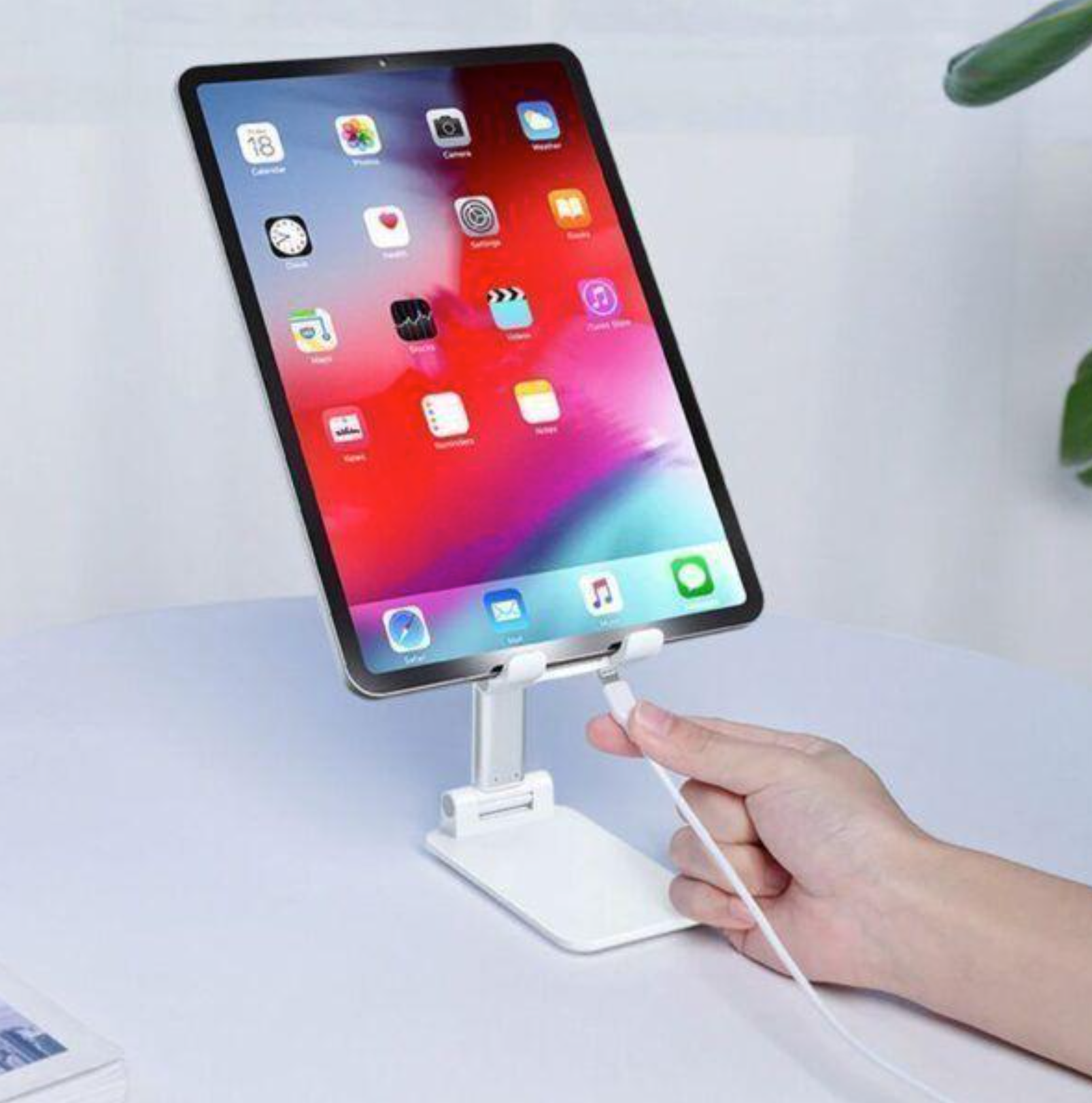 Enjoy hands-free comfort and perfect viewing angles with the HomeVyn Adjustable Foldable Phone & Tablet Stand.